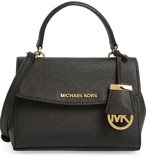 michael kors black bag with red interior|Michael Kors black leather handbag.